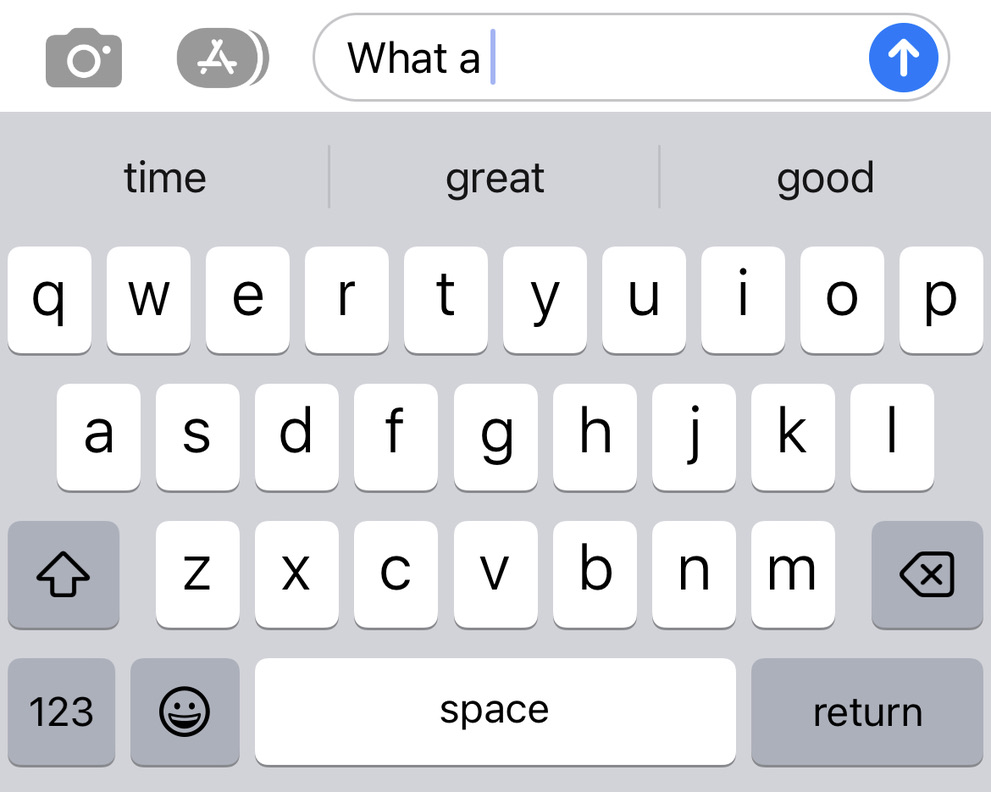 An iPhone keyboard. The text 'What a' has been entered in an input and the suggestion strip above the keys reads 'time, great, good'